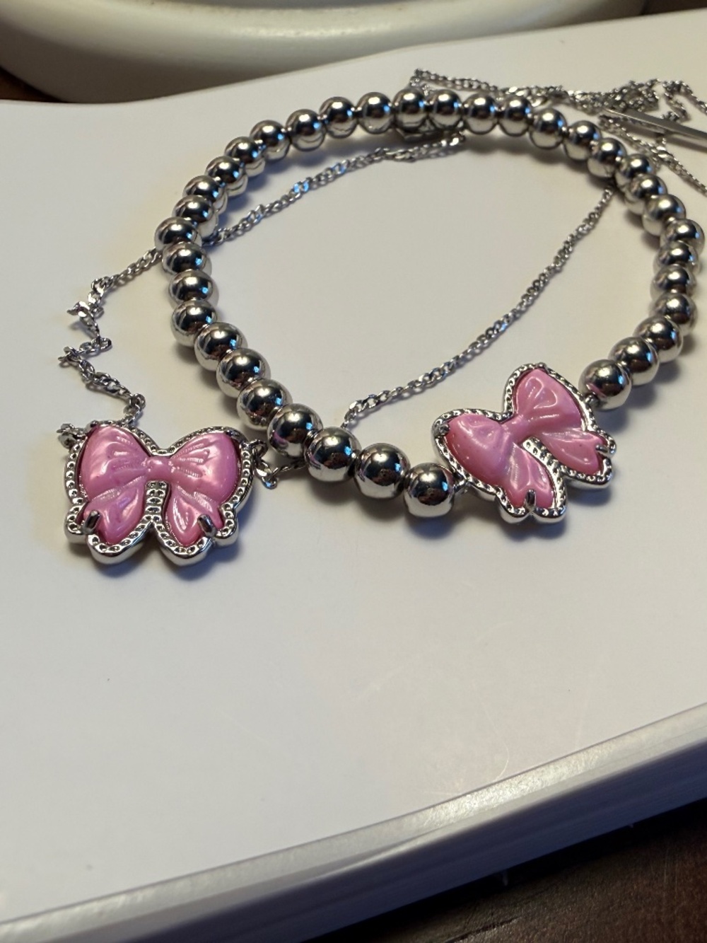 Pink and silver bow set necklace, earrings, and bracelet